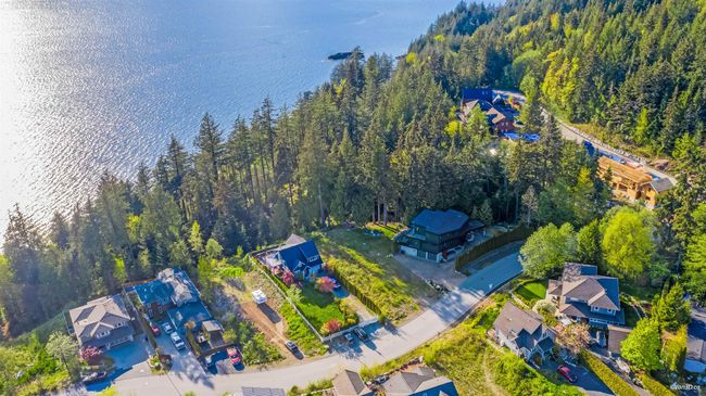 View of property location with a forest, a nearby body of water, and nearby suburban area | Image 16