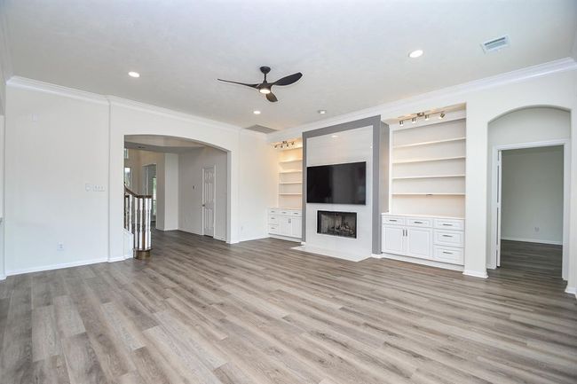 Back in your living room before we head up upstairs - the SPACE in your entertaining space makes hosting big get-togethers a BREEZE! | Image 21