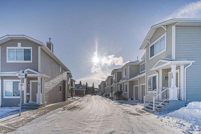 84 Bridleridge Manor Sw, Home with 3 bedrooms, 2 bathrooms and 1 parking in Calgary AB | Image 5