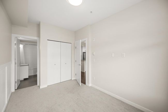 Unfurnished bedroom featuring carpet, a closet, and connected bathroom | Image 27