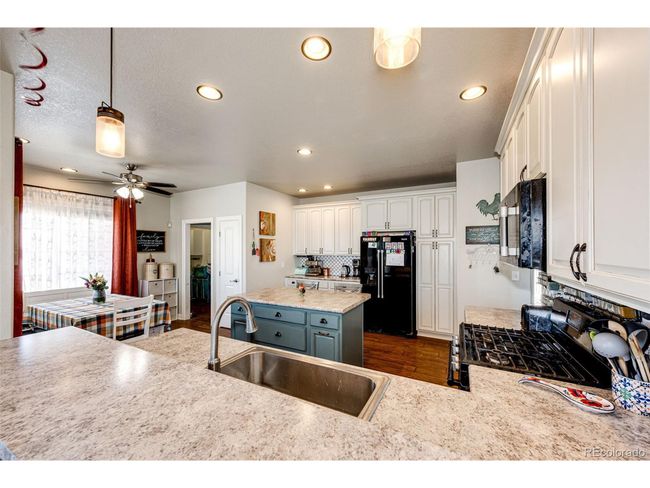 59466 E Commanche Way, House other with 3 bedrooms, 3 bathrooms and null parking in Strasburg CO | Image 9