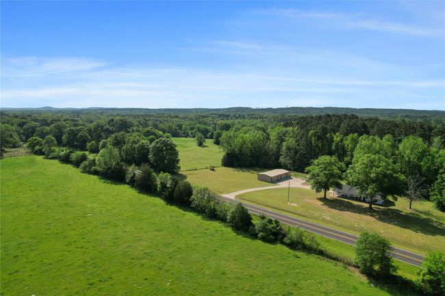 Bird's eye view of a heavily wooded area | Image 7