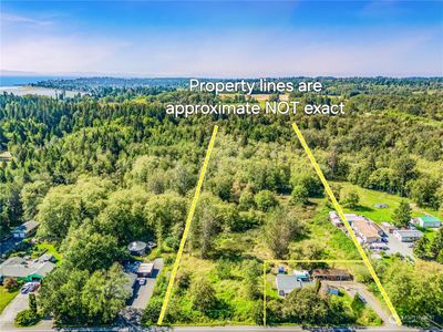 8.9 acres with over half forested/dry and wetlands suspected/evident in first third of parcel. Property in UGA with water/sewer in street so possible subdivision. i.e. multiple homes. | Image 2