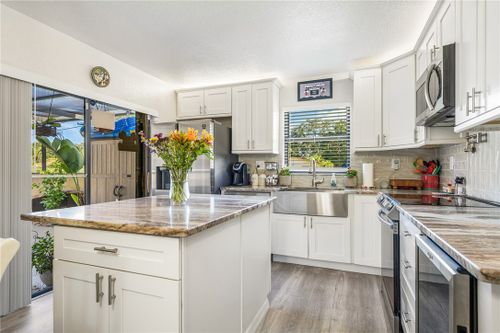 29c-1458 N Lawnwood Cir, Fort Pierce, FL, 34950-6955 | Card Image