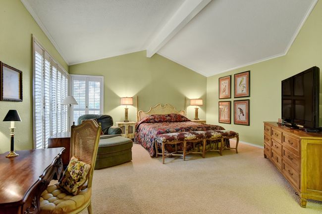 Bedroom featuring light carpet, crown molding, and baseboards | Image 20