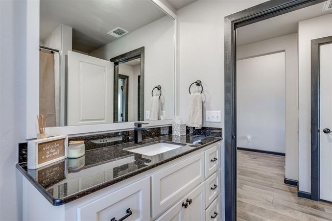 Bathroom featuring vanity, wood finished floors, and visible vents | Image 12