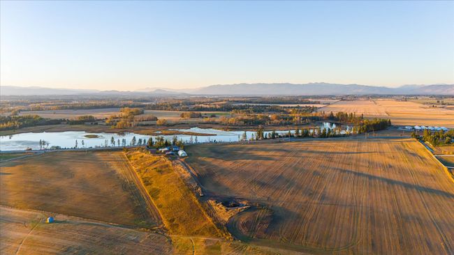 Aerial view at dusk featuring a water and mountain view and a rural view | Image 66