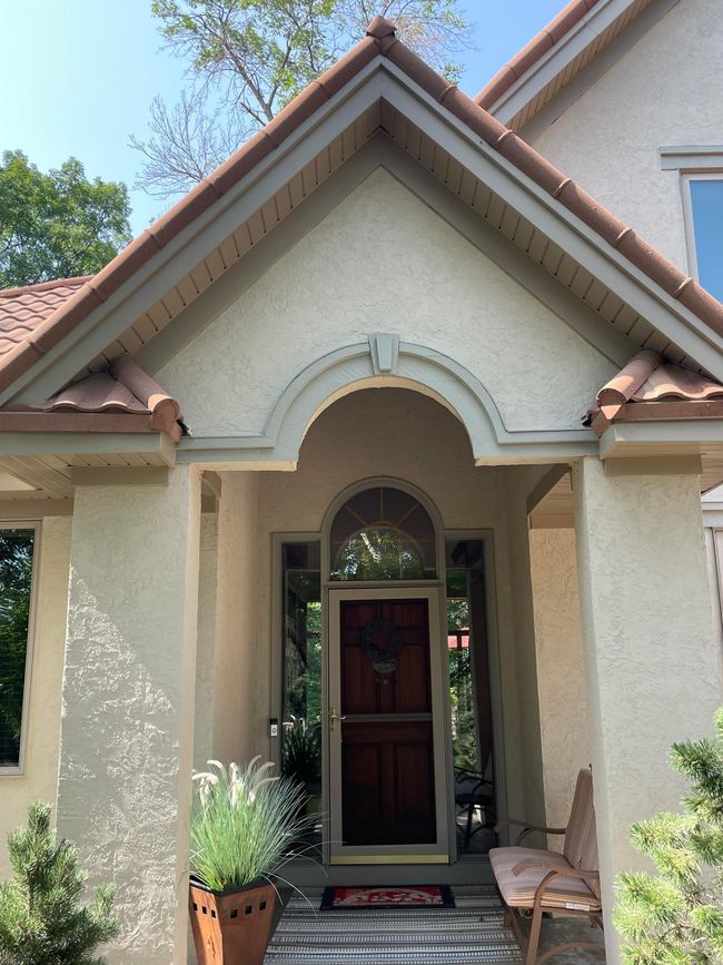 Lots of room out of the weather on this gorgeous front covered porch for Minnesotan 10 minute goodbye's!!!! | Image 4