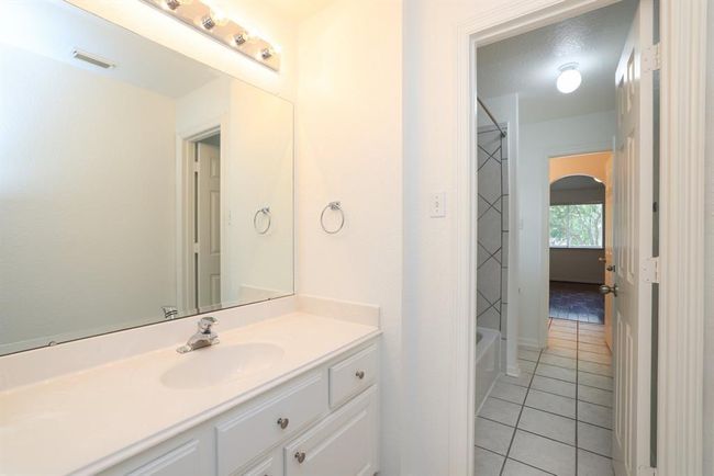 Jack and Jill full bath with private bathing area. | Image 28