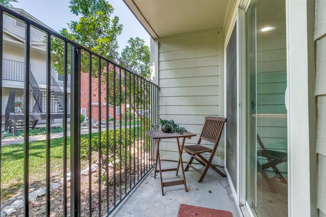 Small patio right off the living room. | Image 11