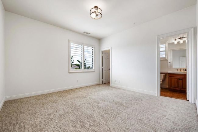1 of 3 secondary bedrooms on the 2nd floor. All bedrooms on the 2nd floor have ensuite and walk in closet. | Image 30