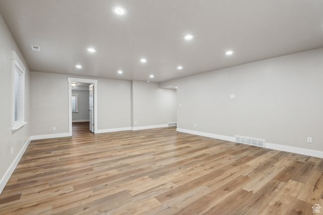 Unfurnished room featuring light hardwood / wood-style floors | Image 30