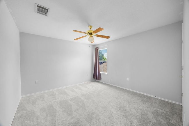 Carpeted spare bedroom | Image 21