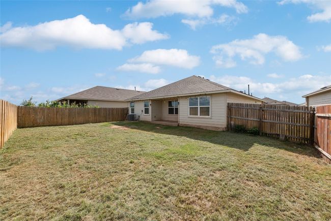 Back of house featuring a fenced backyard | Image 22