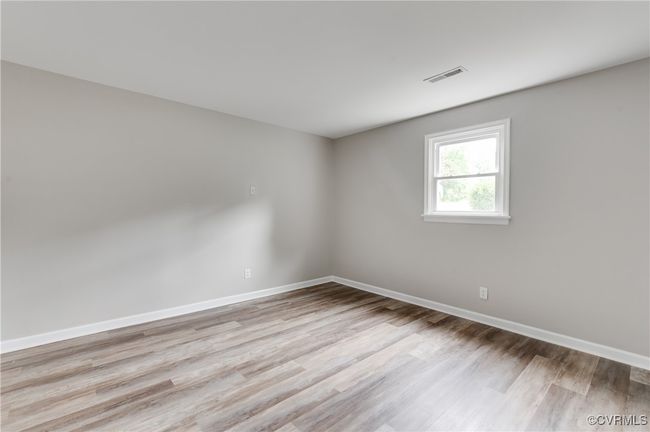 Spare room featuring light wood-style floors and baseboards | Image 19