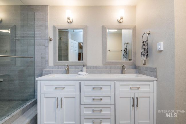 Full bath with double vanity and tiled shower | Image 10