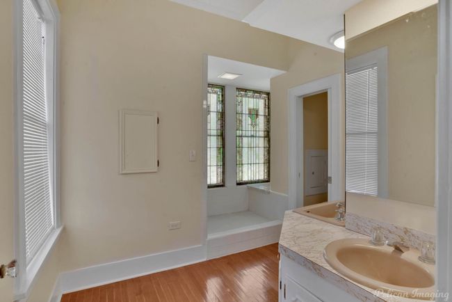 Bathroom with vanity and wood finished floors | Image 25