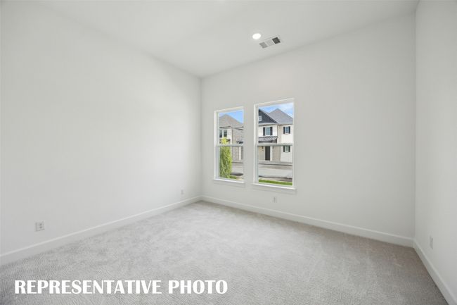 You'll find nicely sized secondary bedrooms in our Royale plan. REPRESENTATIVE PHOTO | Image 16
