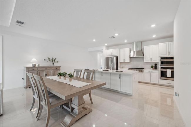 33466 Landsman Loop, House other with 4 bedrooms, 5 bathrooms and null parking in Wesley Chapel FL | Image 7