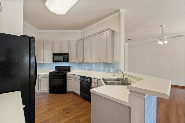 Ample cabinets & space to move about | Image 14