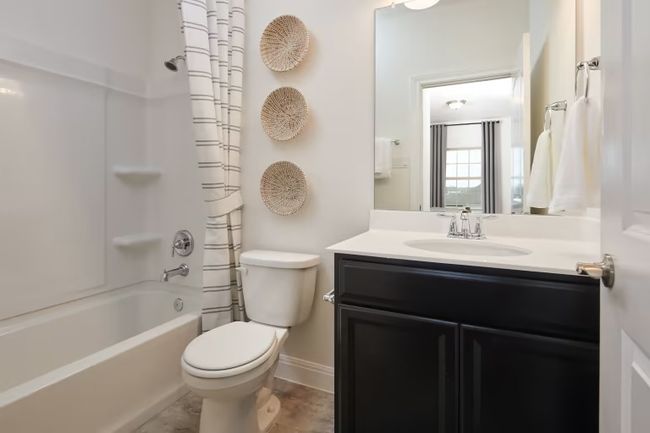 Photo of Pulte model home with same floor plan, not of actual home listed. | Image 23