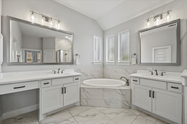 Master bath includes garden tub and separate shower | Image 23