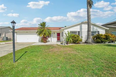 8719 Hickorywood Lane, House other with 3 bedrooms, 2 bathrooms and null parking in Tampa FL | Image 1