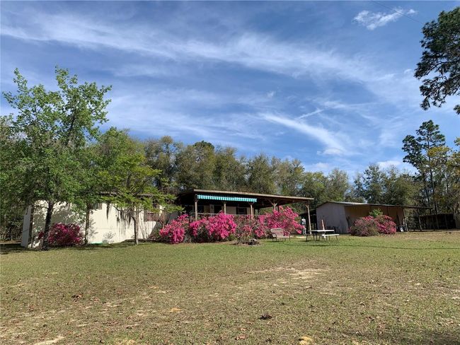 24645 Ne 177 Th Ter, House other with 2 bedrooms, 1 bathrooms and null parking in Fort Mc Coy FL | Image 5