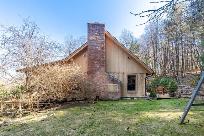 Back of house with a yard, entry steps, and an outbuilding | Image 5