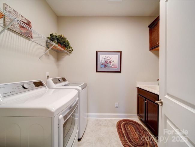 Laundry Room with Built in Storage | Image 19