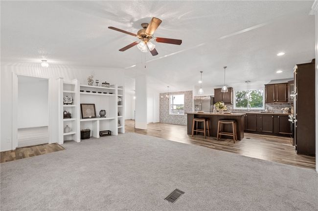 Living area with view to kitchen | Image 9