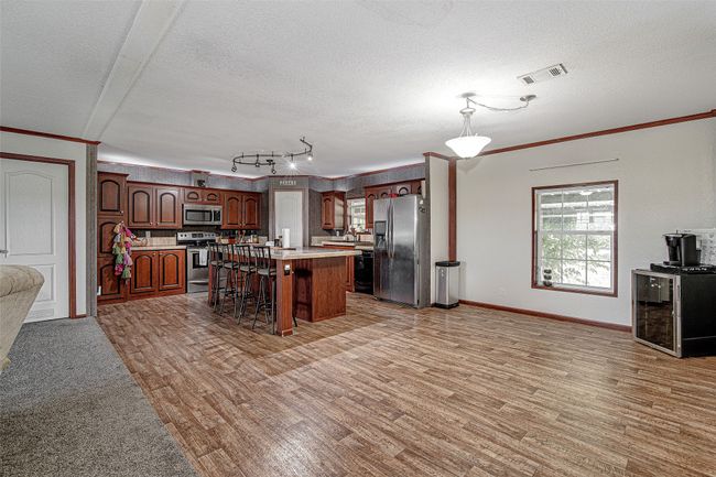 Main house - open concept living/dining/kitchen | Image 8