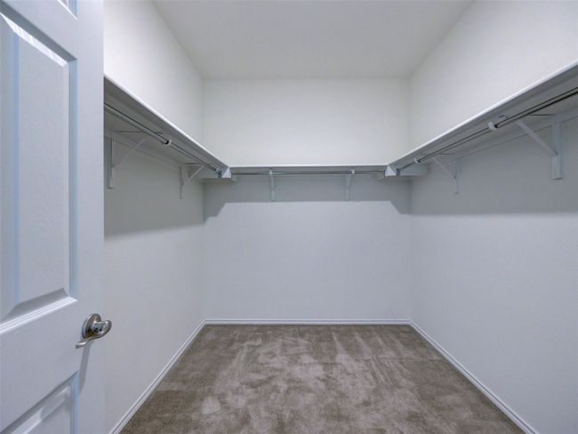 Huge walk in primary closet | Image 25