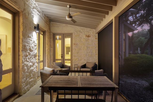 Screened back patio off of main living and kitchen. | Image 7