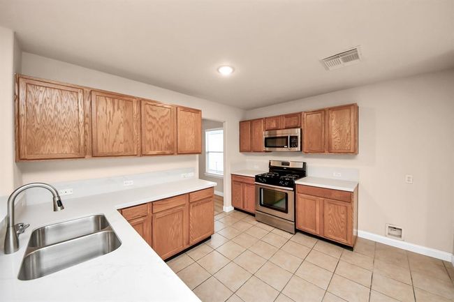 Another view of the kitchen | Image 11