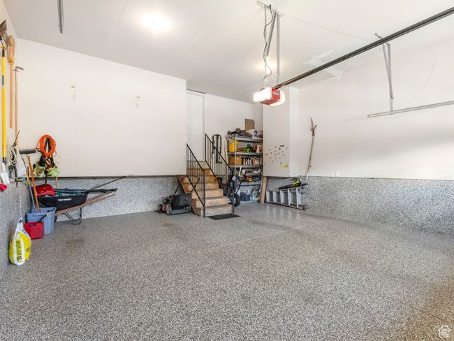 Garage with a garage door opener | Image 29