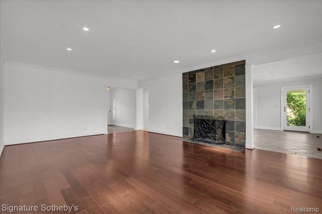 Family Room with Wood-Burning Fireplace | Image 10