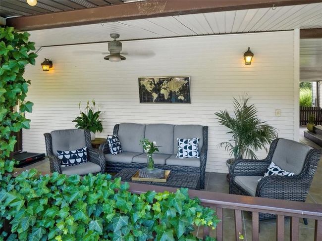 View of patio featuring ceiling fan and an outdoor living space | Image 26