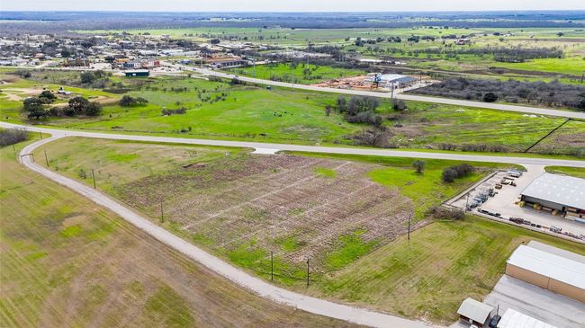 Aerial view of sparsely populated area featuring an industrial area | Image 5