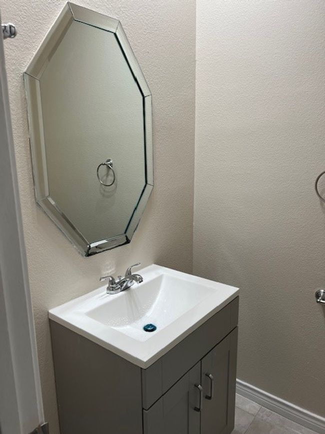 Bathroom featuring vanity | Image 8
