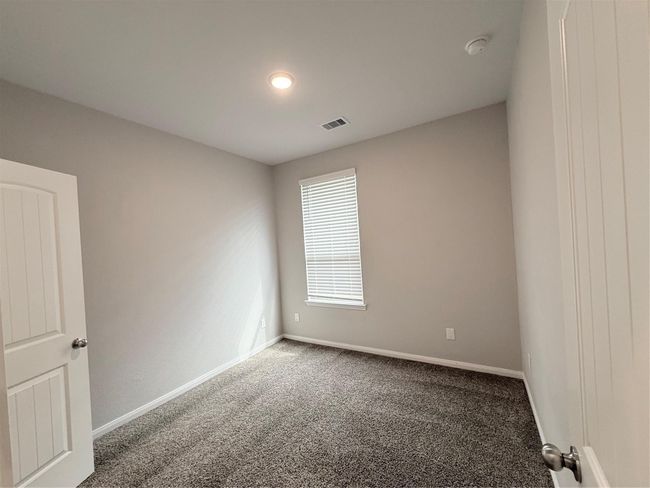 14501 SUGAR PINES DR - Secondary Bedroom - three bedrooms and full bath at the front of the home | Image 38