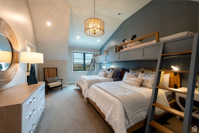 Bedroom featuring vaulted ceiling, carpet, a chandelier, and recessed lighting | Image 49