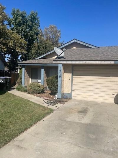 1219 E Ferguson Avenue, House other with 3 bedrooms, 2 bathrooms and null parking in Visalia CA | Image 1