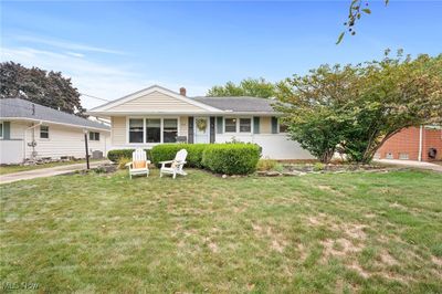 Ranch-style home featuring a front lawn | Image 1