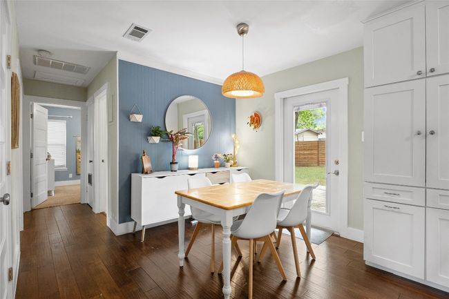 Dining space featuring dark wood-style floors | Image 9