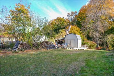 View of yard with a shed | Image 3