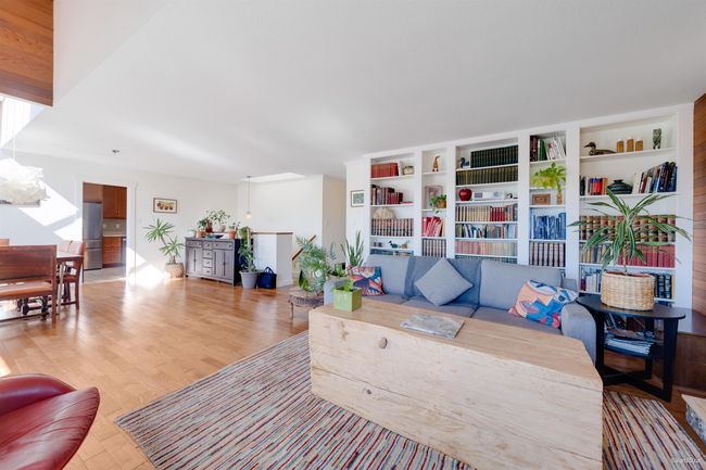 Living room featuring light wood-style flooring | Image 17
