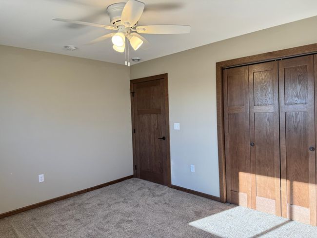 This bedroom door and closet door really show off the solid 3-panel walnut tones- gorgeous! | Image 17