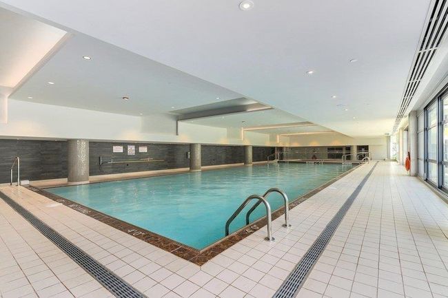 View of indoor community pool | Image 4