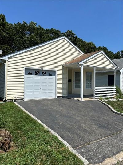 418 Village Circle N, Condo with 2 bedrooms, 2 bathrooms and null parking in Manorville NY | Image 2